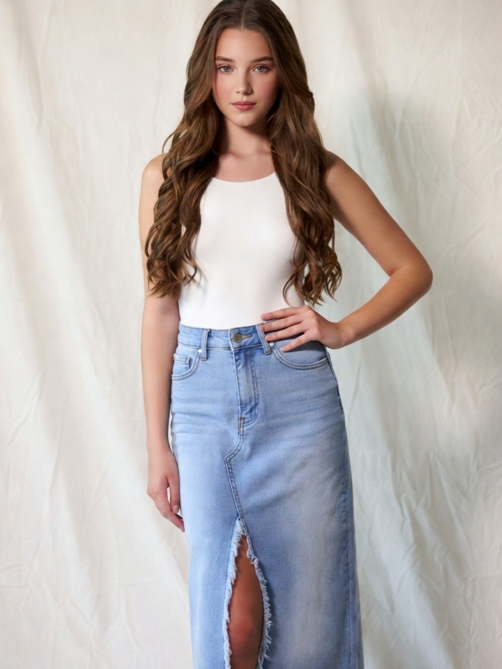 White Sleeveless Bodysuit with Light Blue Denim Maxi Skirt